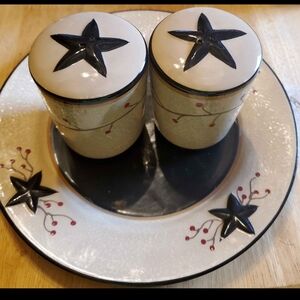 Star salt and pepper shakers on primitive matching plate